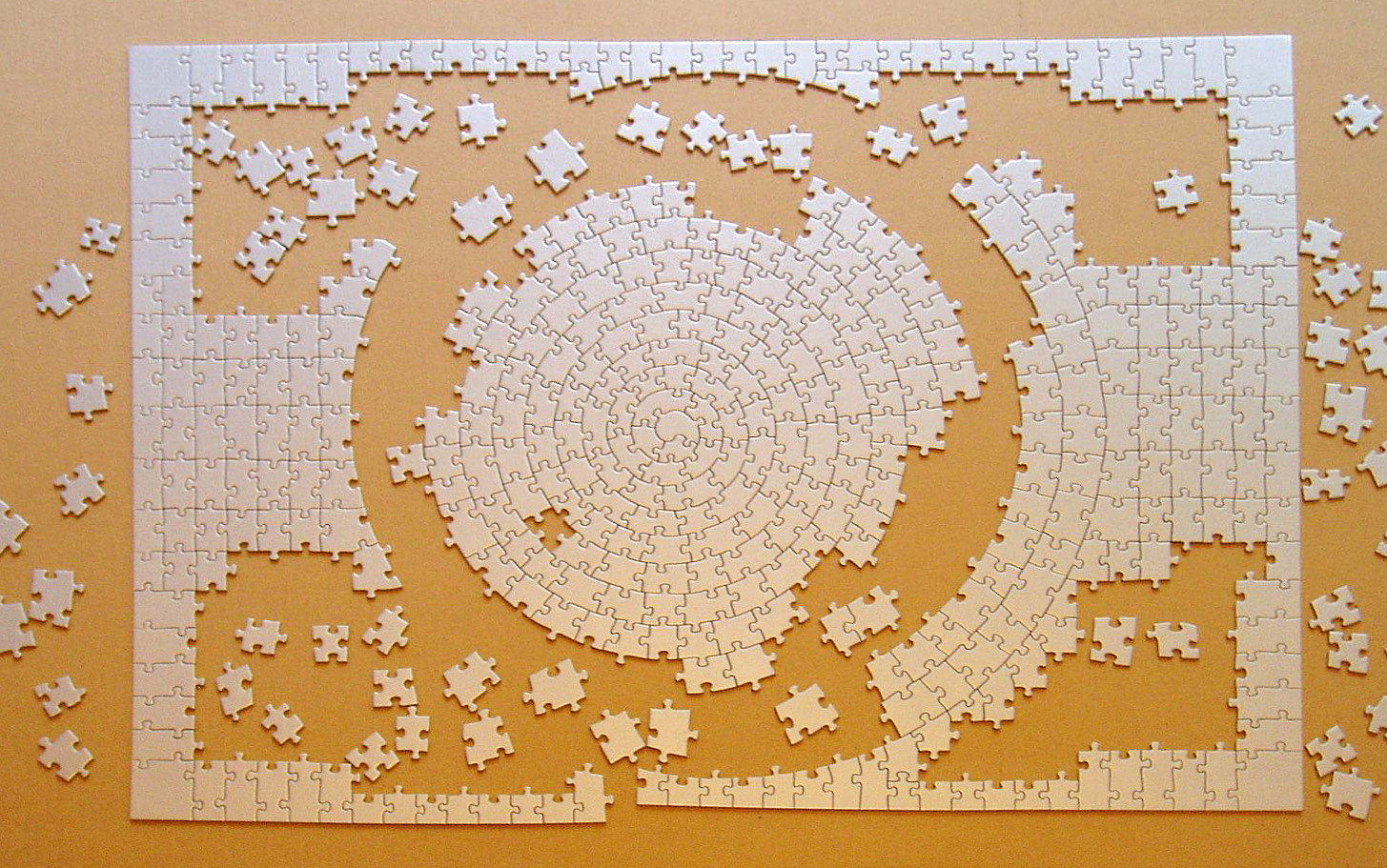 Puzzle, photo by Muns (derivative by Schlurcher), 2009. CC BY-SA 2.0, via Wikimedia Commons.